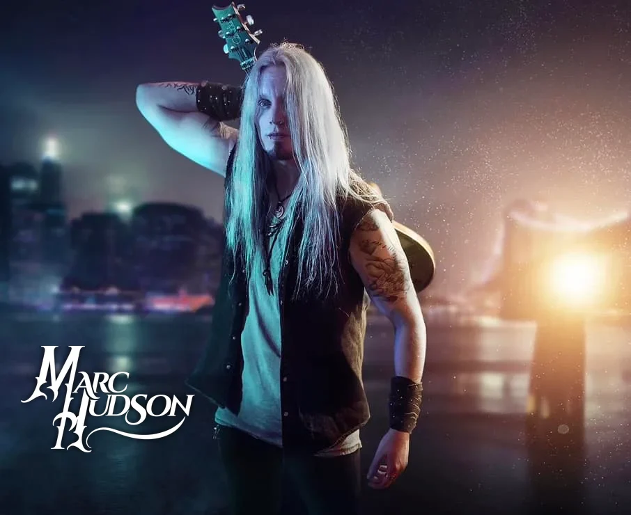 Marc Hudson, vocalist of DragonForce, with his Marc Hudson wordmark